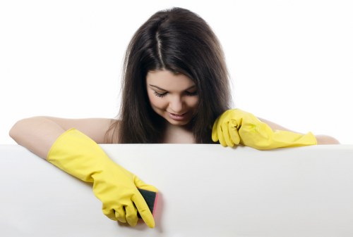 Technician inspecting carpet condition before cleaning